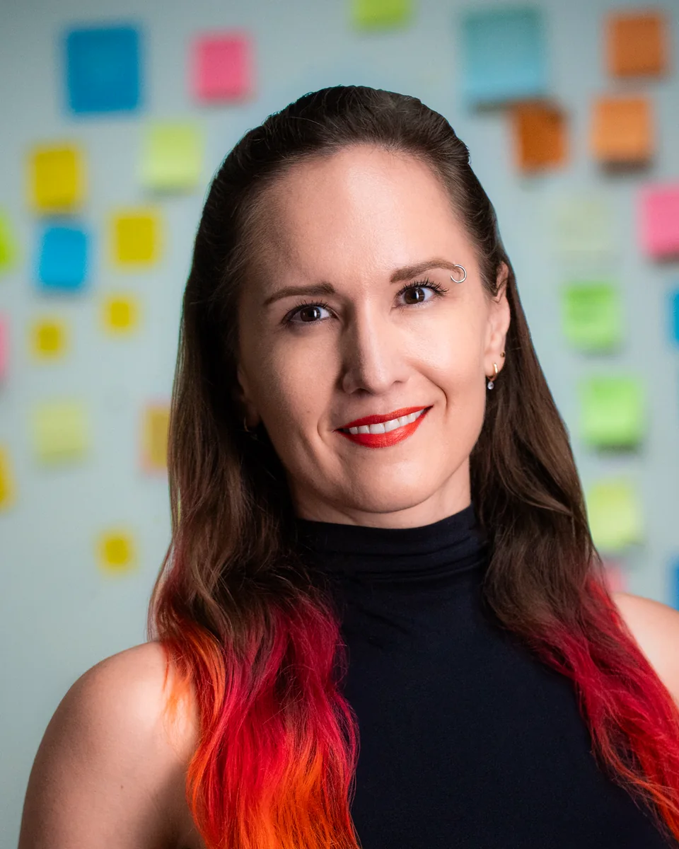 Portrait of Hillary Lyons, featured live speaker at the Q4 Women in Tech Summit